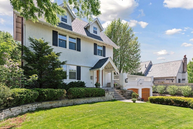 1617 Franklin Ave, Minneapolis, MN 55405 - view of front of property with a front yard, stairway, and a shingled roof