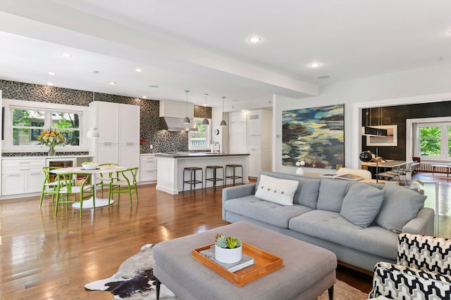 1617 Franklin Ave, Minneapolis, MN 55405 - living area featuring wood finished floors, recessed lighting, and beverage cooler