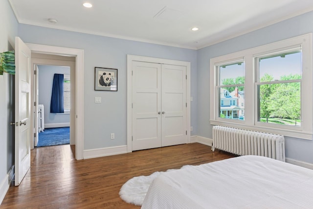 1617 Franklin Ave, Minneapolis, MN 55405 - bedroom with radiator, baseboards, crown molding, dark wood finished floors, and recessed lighting