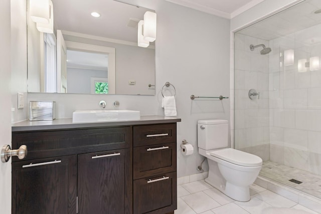 1617 Franklin Ave, Minneapolis, MN 55405 - bathroom with toilet, crown molding, a tile shower, vanity, and baseboards