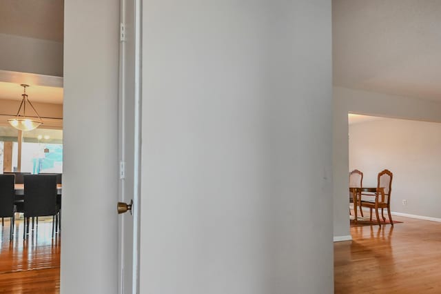 2904 Silver Lake Ct NE, Saint Anthony, MN 55421 - corridor featuring wood finished floors and baseboards