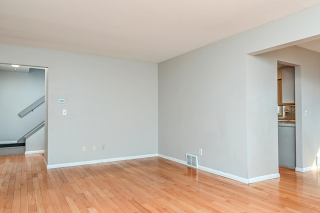 2904 Silver Lake Ct NE, Saint Anthony, MN 55421 - empty room with light wood-type flooring and baseboards