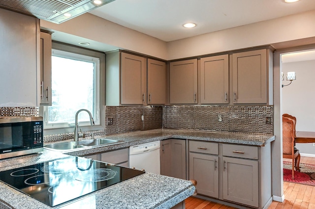 2904 Silver Lake Ct NE, Saint Anthony, MN 55421 - kitchen featuring stainless steel microwave, white dishwasher, gray cabinetry, light wood-type flooring, and recessed lighting