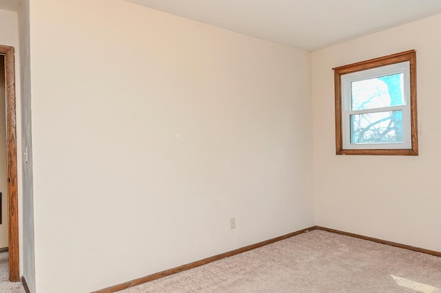 2904 Silver Lake Ct NE, Saint Anthony, MN 55421 - spare room with light carpet and baseboards