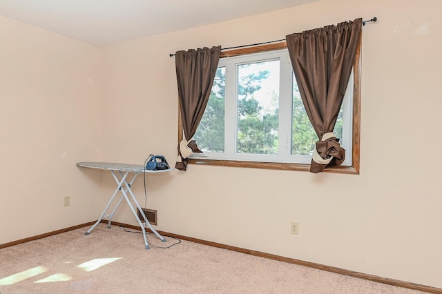 2904 Silver Lake Ct NE, Saint Anthony, MN 55421 - carpeted empty room featuring baseboards