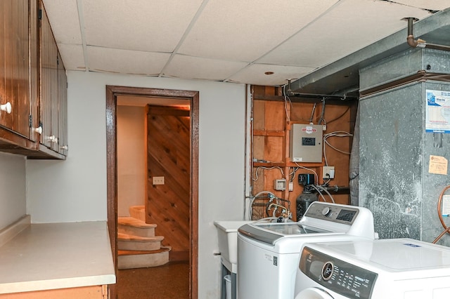 2904 Silver Lake Ct NE, Saint Anthony, MN 55421 - washroom with washer and dryer, cabinet space, and electric panel