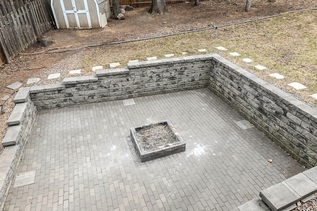 2904 Silver Lake Ct NE, Saint Anthony, MN 55421 - fenced backyard with an outdoor fire pit