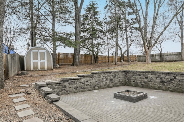 2904 Silver Lake Ct NE, Saint Anthony, MN 55421 - fenced backyard with a fire pit and a patio area