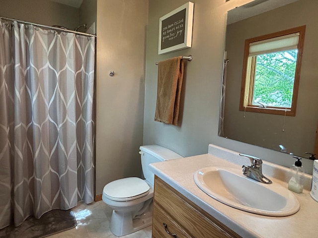 33617 Charlie Trapp Rd, Dent, MN 56528 - bathroom with toilet, vanity, a shower with curtain, and tile patterned floors