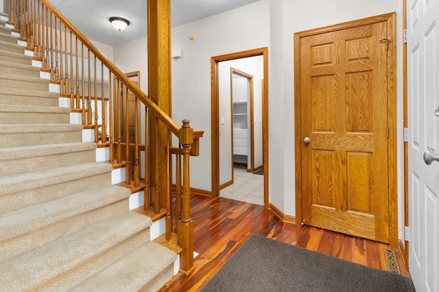 1212 Mill Creek Cir, Saint Cloud, MN 56303 - foyer entrance with wood finished floors and stairs