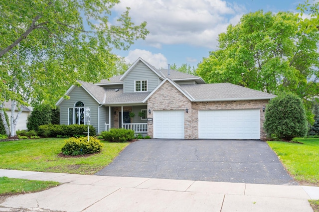 1212 Mill Creek Cir, Saint Cloud, MN 56303 - traditional home with a garage, driveway, a front yard, and brick siding