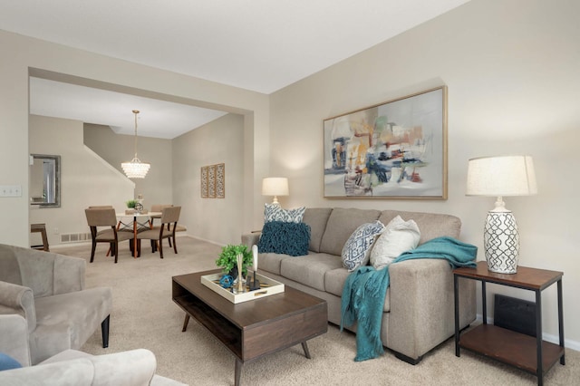 13872 52nd Ave N, Plymouth, MN 55446 - carpeted living area featuring baseboards and a chandelier