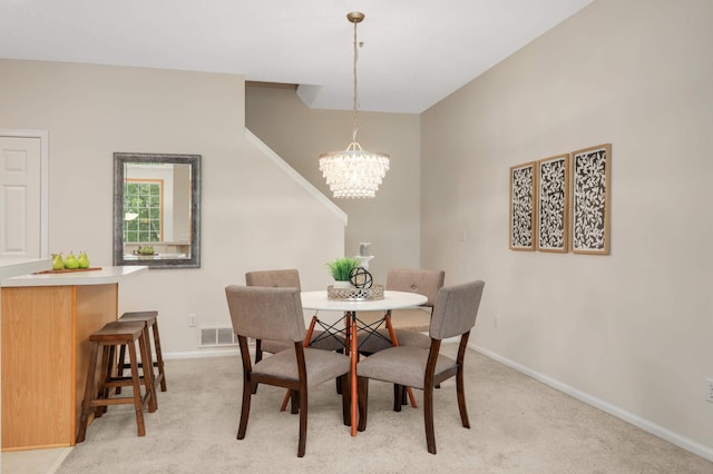 13872 52nd Ave N, Plymouth, MN 55446 - dining area with a chandelier, light colored carpet, and baseboards