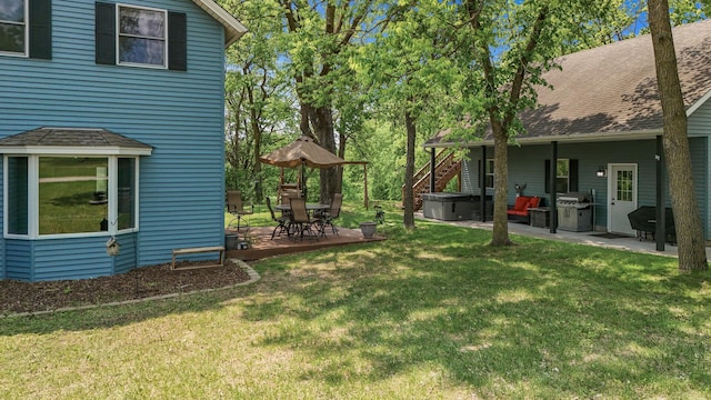12801 40th St NE, Saint Michael, MN 55376 - view of green lawn with a hot tub and a patio area