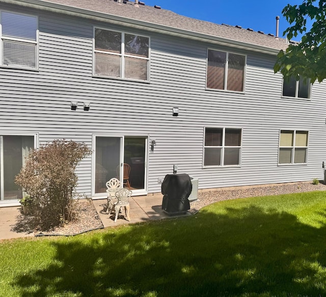 16895 78th Pl N, Maple Grove, MN 55311 - rear view of property with a yard and a patio area