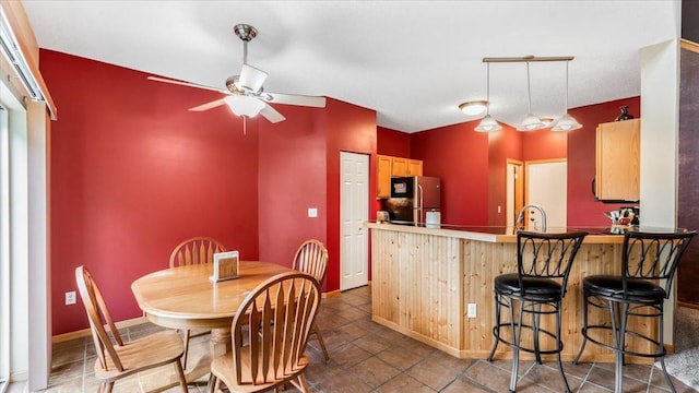 16895 78th Pl N, Maple Grove, MN 55311 - dining room with a ceiling fan and baseboards