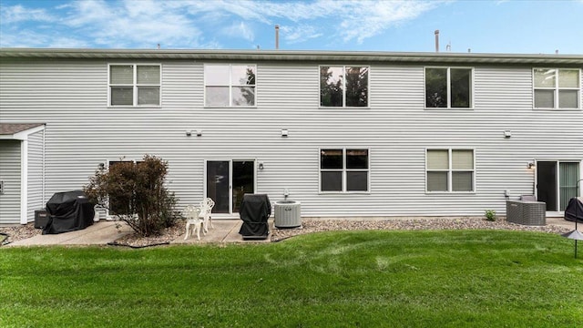 16895 78th Pl N, Maple Grove, MN 55311 - back of house with a yard, a patio area, and central AC unit