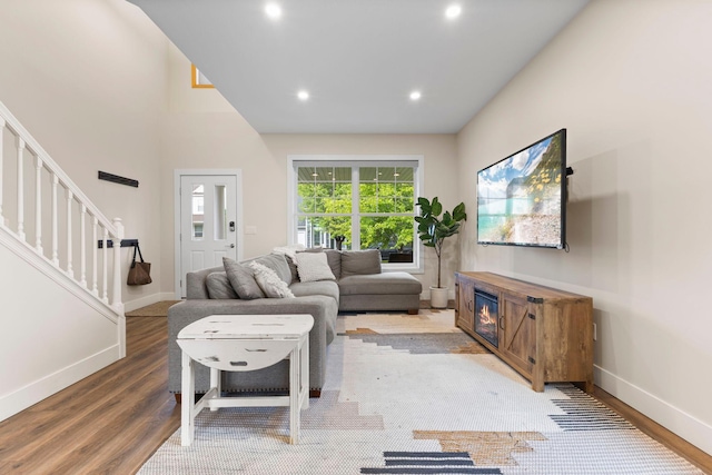 11955 84th Pl N, Maple Grove, MN 55369 - living area with wood finished floors, baseboards, stairway, and recessed lighting