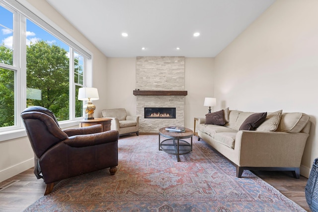 11955 84th Pl N, Maple Grove, MN 55369 - living area with recessed lighting, wood finished floors, a fireplace, and baseboards