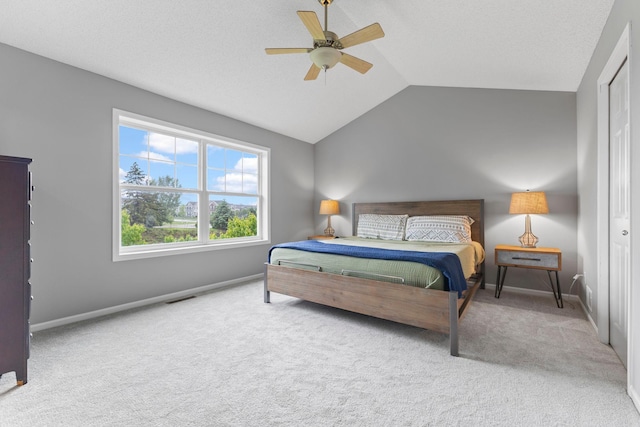 11955 84th Pl N, Maple Grove, MN 55369 - carpeted bedroom featuring lofted ceiling, baseboards, and ceiling fan