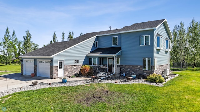 6056 170th Ave SE, Walcott, ND 58077 - view of front of home with driveway, an attached garage, a front yard, and stone siding