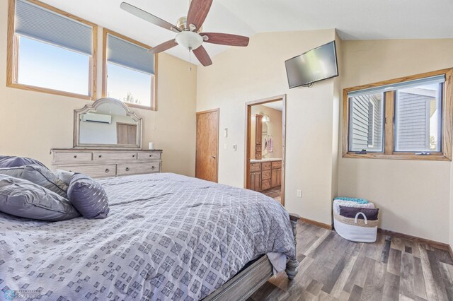 6056 170th Ave SE, Walcott, ND 58077 - bedroom with lofted ceiling, wood finished floors, baseboards, and ensuite bath