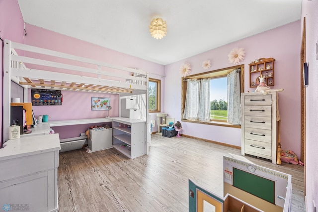 6056 170th Ave SE, Walcott, ND 58077 - bedroom featuring light wood-style floors and baseboards