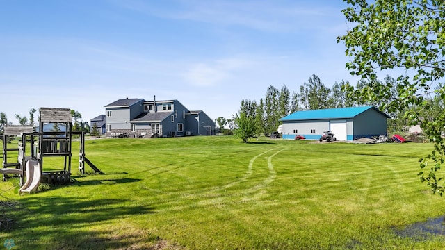6056 170th Ave SE, Walcott, ND 58077 - view of grassy yard featuring an outdoor structure