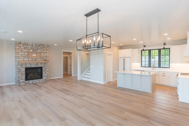 29655 E Horseshoe Lake Rd, Mission Twp, MN 56465 - kitchen with a center island, built in fridge, light countertops, white cabinetry, and a sink