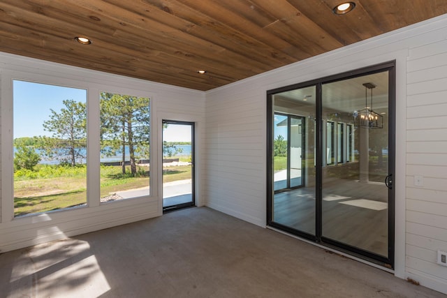 29655 E Horseshoe Lake Rd, Mission Twp, MN 56465 - unfurnished sunroom featuring a chandelier