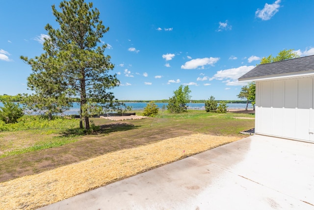 29655 E Horseshoe Lake Rd, Mission Twp, MN 56465 - view of grassy yard featuring a water view and a patio area