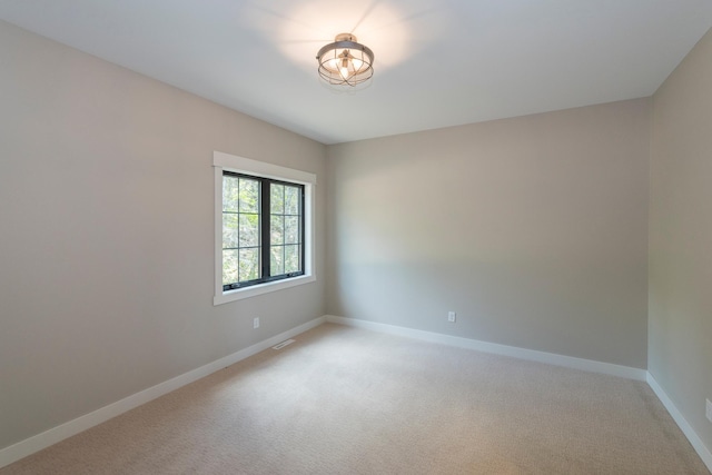 29655 E Horseshoe Lake Rd, Mission Twp, MN 56465 - spare room featuring baseboards and light colored carpet