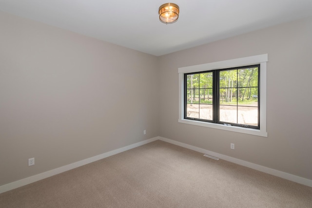 29655 E Horseshoe Lake Rd, Mission Twp, MN 56465 - unfurnished room with light carpet and baseboards