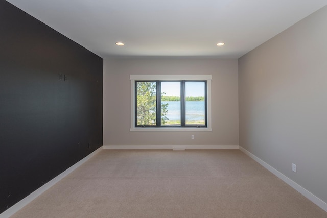 29655 E Horseshoe Lake Rd, Mission Twp, MN 56465 - empty room featuring recessed lighting, light colored carpet, and baseboards