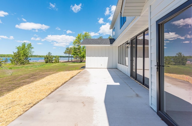 29655 E Horseshoe Lake Rd, Mission Twp, MN 56465 - view of patio / terrace with a water view