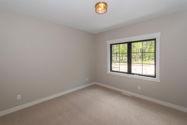 29655 E Horseshoe Lake Rd, Mission Twp, MN 56465 - unfurnished room featuring light colored carpet and baseboards