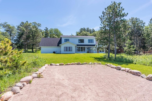 29655 E Horseshoe Lake Rd, Mission Twp, MN 56465 - rear view of house featuring a lawn