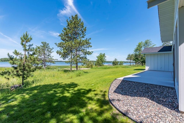 29655 E Horseshoe Lake Rd, Mission Twp, MN 56465 - view of grassy yard featuring a water view and a patio