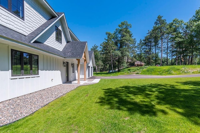 29655 E Horseshoe Lake Rd, Mission Twp, MN 56465 - view of grassy yard with a garage