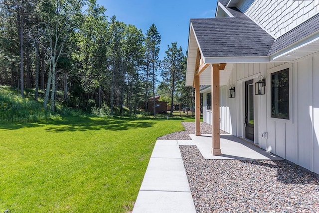 29655 E Horseshoe Lake Rd, Mission Twp, MN 56465 - view of green lawn with a patio area