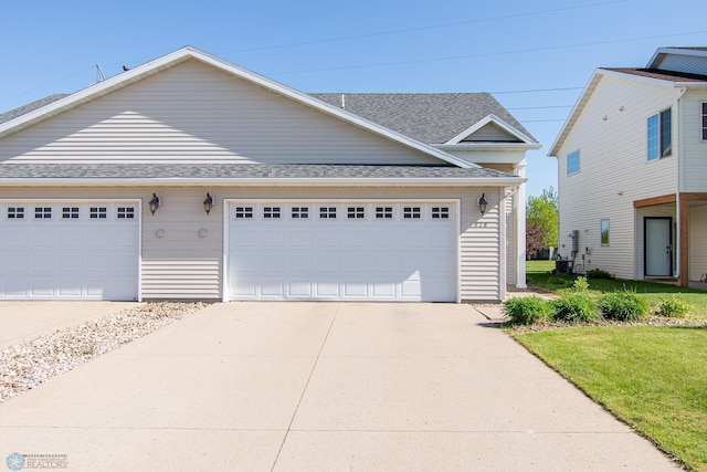828 Cinnamon Ridge Pl, West Fargo, ND 58078 - view of front facade featuring roof with shingles, concrete driveway, a front yard, and an outdoor structure