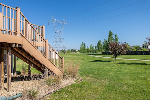 828 Cinnamon Ridge Pl, West Fargo, ND 58078 - view of grassy yard featuring stairway and a wooden deck