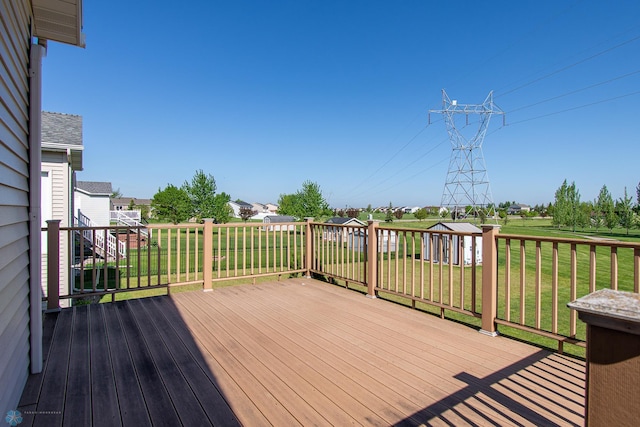 828 Cinnamon Ridge Pl, West Fargo, ND 58078 - wooden deck with a yard, an outdoor structure, and a residential view
