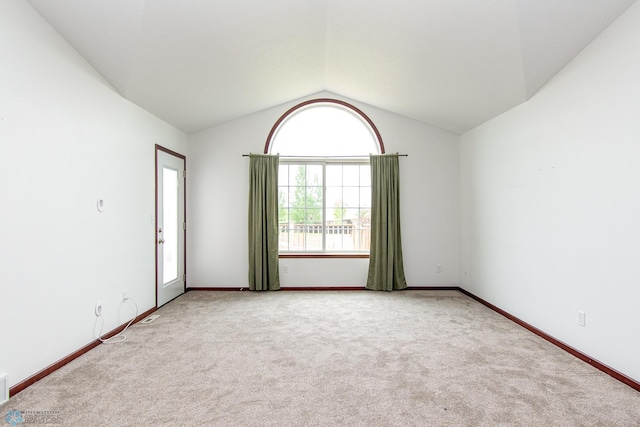 828 Cinnamon Ridge Pl, West Fargo, ND 58078 - empty room with carpet flooring, lofted ceiling, and baseboards