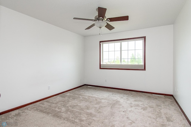 828 Cinnamon Ridge Pl, West Fargo, ND 58078 - unfurnished room featuring carpet, baseboards, and a ceiling fan