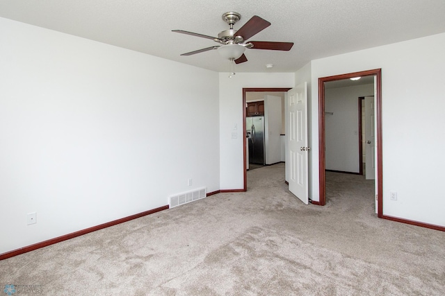 828 Cinnamon Ridge Pl, West Fargo, ND 58078 - carpeted spare room with a ceiling fan and baseboards