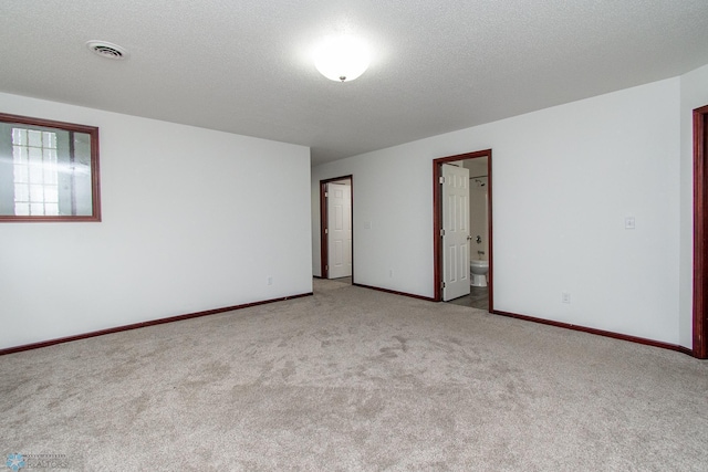 828 Cinnamon Ridge Pl, West Fargo, ND 58078 - empty room featuring carpet flooring, baseboards, and a textured ceiling