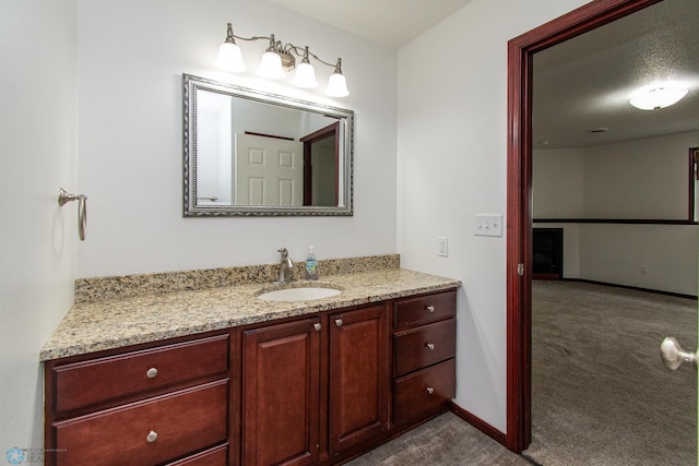 828 Cinnamon Ridge Pl, West Fargo, ND 58078 - bathroom with vanity and baseboards