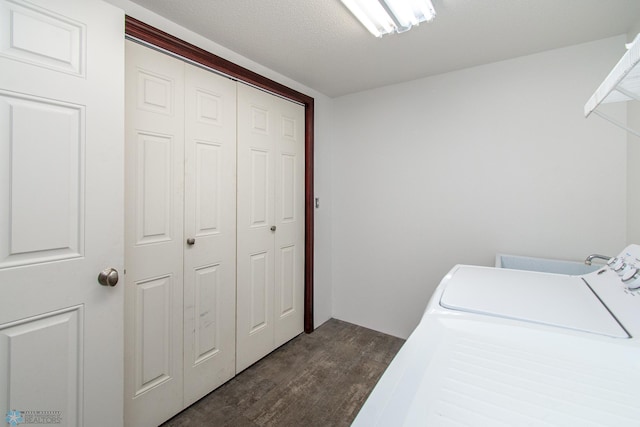 828 Cinnamon Ridge Pl, West Fargo, ND 58078 - washroom with dark wood-style flooring and washing machine and dryer