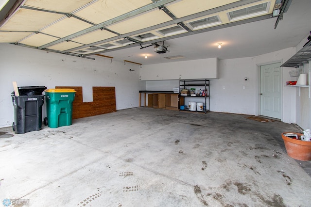 828 Cinnamon Ridge Pl, West Fargo, ND 58078 - garage featuring a garage door opener